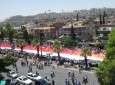 بزرگترین پرچم سوریه  و حمایت از "بشار اسد"  