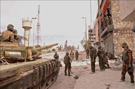 الجيش السوري يدخل الخالدية بحمص ومصور الإخبارية  يلتحق بالشهداء