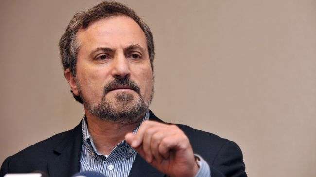 SNC spokesman Louay Safi addresses a news conference in Istanbul on May 26, 2013.