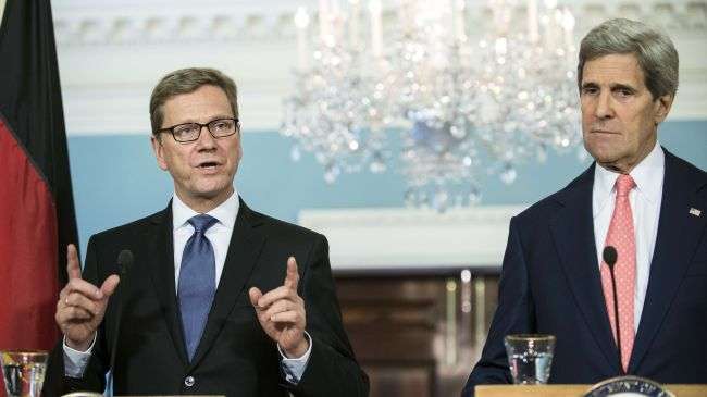 US Secretary of State John Kerry (R) and German Foreign Minister Guido Westerwelle