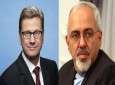 Iranian Foreign Minister Mohammad Javad Zarif (R) and his German counterpart Guido Westerwelle