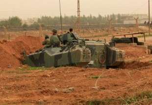 Turkish forces fire artillery into Syrian territory