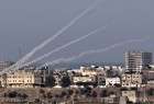Qassam fighters fire rockets at Israeli cities