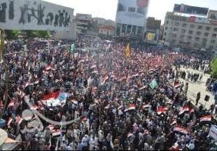 الالاف يتظاهرون في بغداد احتجاجا على التدخل الاميركي في العرا ق