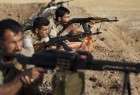 Kurdish fighters retake more areas from ISIL