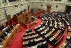 Greece adopts law on cash reserves