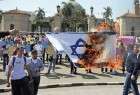 حرق العلم الإسرائيلي وسط القاهرة تنديدا بحرق الرضيع الفلسطيني