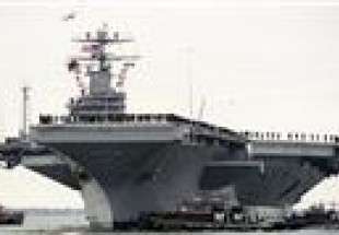 US pulls aircraft carrier out of Persian Gulf as Russian ships enter
