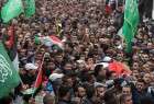 1000s hold funeral for 2 Palestinians killed by Israel