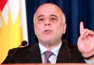 Iraqi premier warns against sending troops to Syria