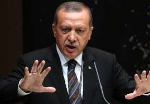 إردوغان يتهم التحالف الدولي بدعم تنظيم داعش