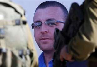 Le régime sioniste inculpe de nouveau le journaliste palestinien Mohammed al-Qiq