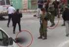 Des colons israéliens saluent un soldat tueur