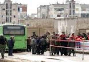 انتهاء عملية خروج الدفعة الاولى من المسلحين من حي الوعر في حمص