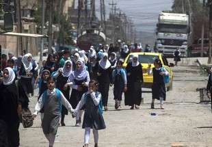 Iraqi Students Return to Schools in Mosul  