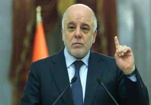 Largest group in Iraqi parliament backs Baghdad govt.
