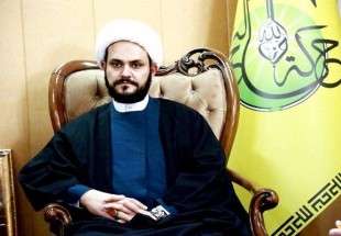 الشيخ أكرم كعبي يقلد الشيخ حمود درع المقاومة العراقية