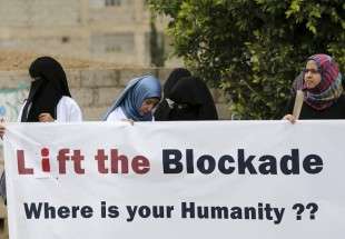 Healthcare workers demonstrate against a blockade on Yemen imposed by a Saudi-led coalition, outside the headquarters of the United Nations in Yemen