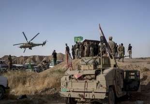 القطعات العسكرية العراقية تصل الى الحدود مع سوريا