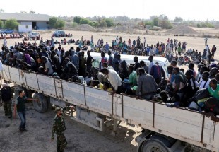 Migrants are transported to detention center in coastal city of Sabratha, Libya in October