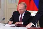 Russia’s Putin signs ‘foreign agents’ media law