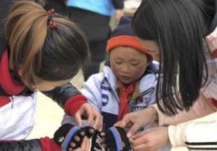 "طفل الثلج" يزعزع الإنترنت في الصين.. والتبرعات تغمر عائلته ومدرسته