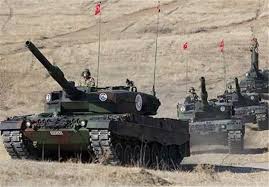 Turkey deploys military vehicles to Syrian border