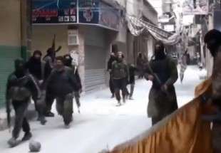 "داعش" يصلب أربعة شبان في مخيم اليرموك بذريعة غريبة!