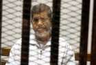 نجل مرسي: لم ندوَّل حالة والدي الصحية
