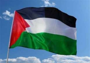 اهتزاز پرچم فلسطين روي ساختماني در نيوجرسي آمريکا