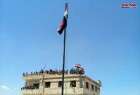 صورة لرفع علم الجمهورية العربية السورية في مدينة الرستن بريف حمص الشمالي بعد إخلائها من المجموعات المسلحة.
