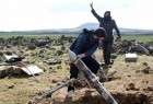 Syria militants hand over heavy arms to government forces