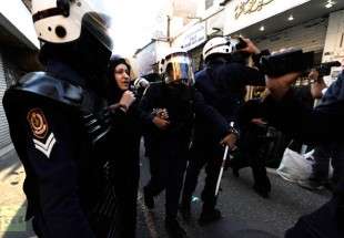 Bahraini regime forces raided over 59 houses, detained 42 activists in June: Monitor