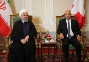 Iranian, Swiss presidents call for promoting ties