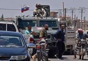الشرطة العسكرية الروسية ترافق النازحين إلى ديارهم في درعا السورية
