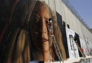 Italian artist detained over graffiti of Palestinian girl mural