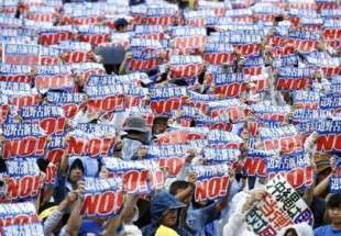 70,000 protest US base expansion on Japanese island