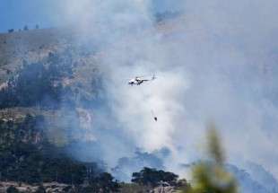 إخماد حريق في محمية طبيعية بواسطة الطائرات في القرم