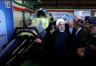 روحاني يزيح الستار عن اول طائرة ايرانية قتالية تدريبية متطورة