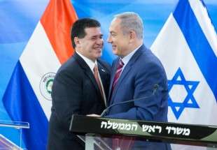 Israeli Prime Minister Benjamin Netanyahu [right] meets with the then Paraguan President Horacio Manuel Cartes Jara, at the Israeli Prime Minister