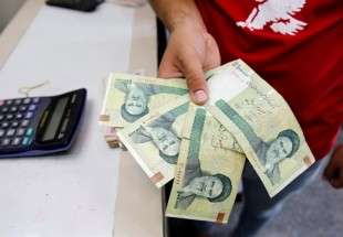 Iran lets money exchange houses import foreign bills as rial sinks