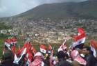 احتفالات على طرفي السياج بين الجولان المحرر والمحتل بذكرى استعادة الجيش السوري القنيطرة