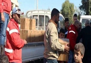 ​توزیع کمک‌های بشردوستانه هلال احمر سوریه در شهر «حسکه»