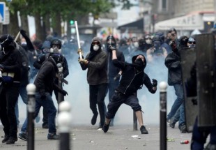 French police, protesters clash in Paris, 205 arrested