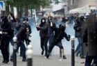 French police, protesters clash in Paris, 205 arrested