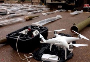 Syrian government forces discover reconnaissance drones, weapons in Dara’a