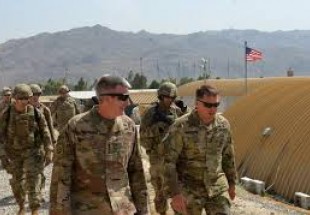 US to cut number of troops in Afghanistan in half