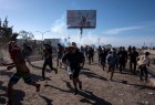 US border agents stop Mexican migrants with tear gas