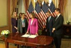 House Speaker Pelosi signs worker back pay bill amid shutdown