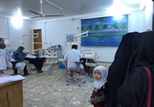 ​فريق طبي ايراني يقدم خدماته بالمجان لايتام النجف